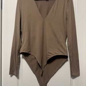 Brown bodysuit with a v neckline